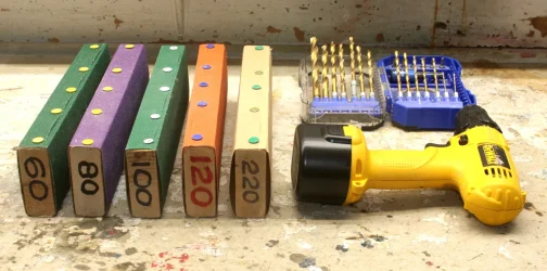 Sanding blocks and hand drill.webp